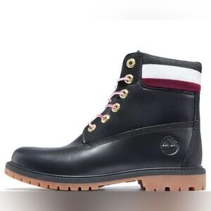 Timberland women's 6"heritage Black Boots with Pink Accents.  Almost perfect.